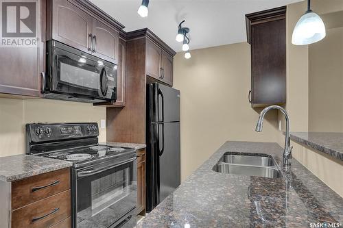 208 1220 Blackfoot Drive, Regina, SK - Indoor Photo Showing Kitchen With Double Sink