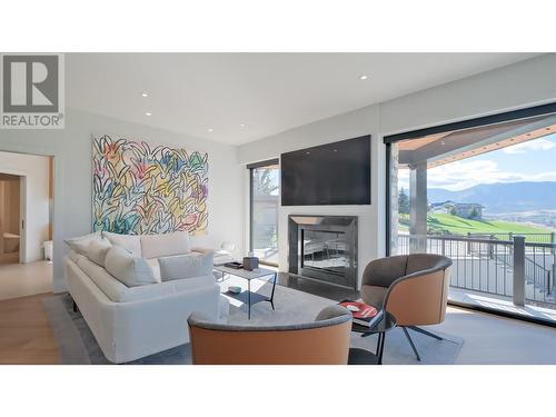 331 & 345 Lower Bench Road, Penticton, BC - Indoor Photo Showing Living Room With Fireplace