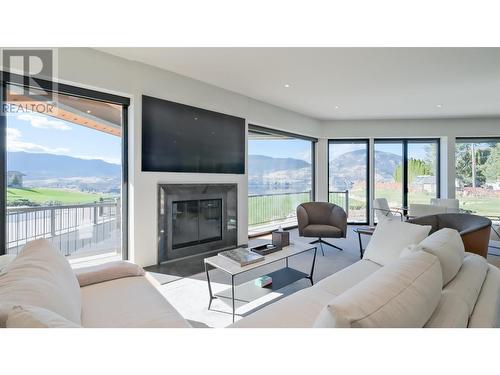 331 & 345 Lower Bench Road, Penticton, BC - Indoor Photo Showing Living Room With Fireplace