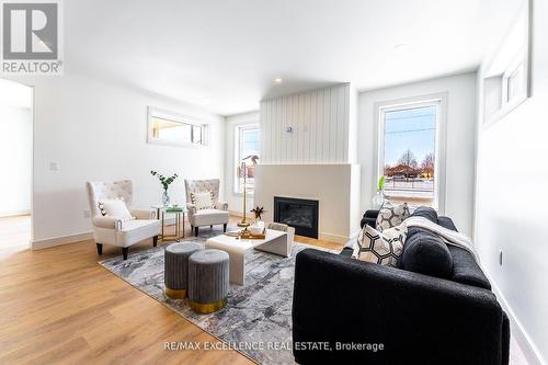 73 Trailview Drive, Tillsonburg, ON - Indoor Photo Showing Living Room With Fireplace