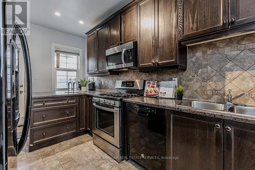 49 Tisdale Street S, Hamilton, ON - Indoor Photo Showing Kitchen With Double Sink