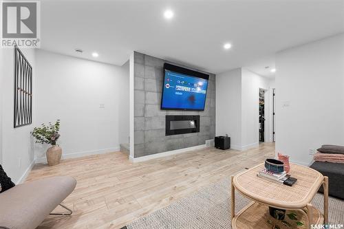 3135 Green Brook Road, Regina, SK - Indoor Photo Showing Living Room With Fireplace