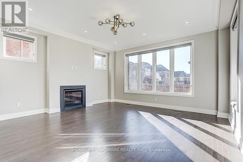 42 St Ives Crescent, Whitby, ON - Indoor Photo Showing Living Room With Fireplace