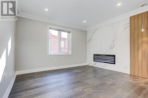 42 St Ives Crescent, Whitby, ON - Indoor Photo Showing Living Room With Fireplace