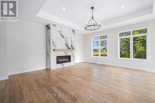 1685 Trizisky Street, North Dundas, ON - Indoor Photo Showing Living Room With Fireplace