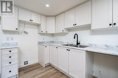 B - 10 Aldersgate Drive, Belleville, ON - Indoor Photo Showing Kitchen With Double Sink