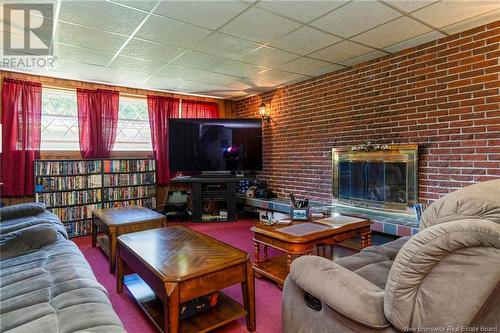 4 Charles Crescent, Rothesay, NB - Indoor Photo Showing Living Room With Fireplace