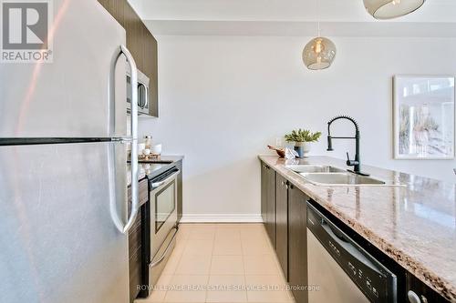 19 - 5056 New Street, Burlington, ON - Indoor Photo Showing Kitchen With Double Sink