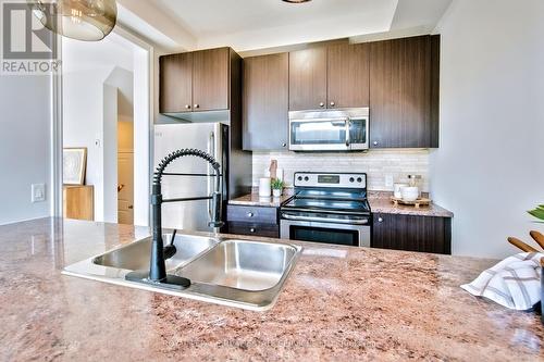 19 - 5056 New Street, Burlington, ON - Indoor Photo Showing Kitchen With Double Sink