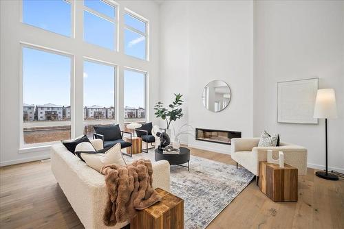 127 Windflower Road, Winnipeg, MB - Indoor Photo Showing Living Room With Fireplace