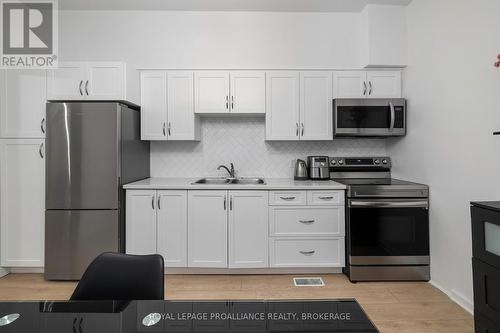 275 Division Street, Kingston (East Of Sir John A. Blvd), ON - Indoor Photo Showing Kitchen With Double Sink