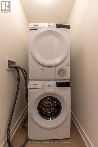 707 - 859 The Queensway, Toronto, ON - Indoor Photo Showing Laundry Room