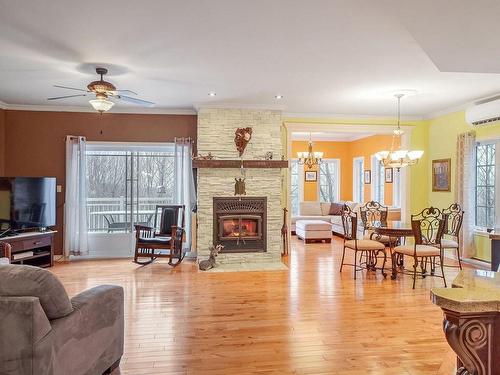 Vue d'ensemble - 200 Rue Bruno, Saint-Jean-De-Matha, QC - Indoor Photo Showing Living Room With Fireplace