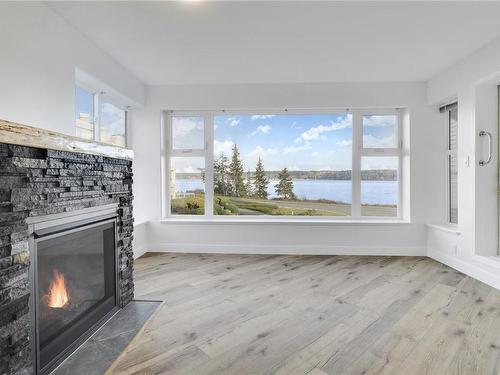 206-350 Island Hwy South, Campbell River, BC - Indoor Photo Showing Living Room With Fireplace