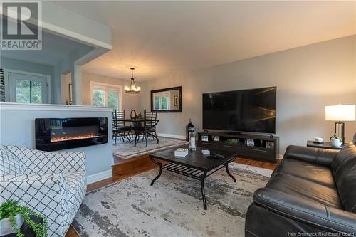 55 Monaco Drive, Rothesay, NB - Indoor Photo Showing Living Room With Fireplace