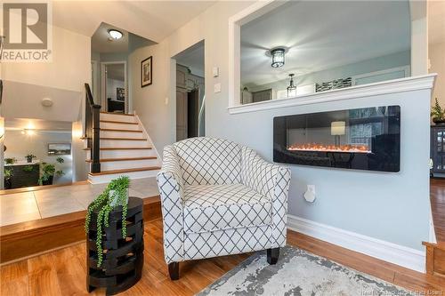 55 Monaco Drive, Rothesay, NB - Indoor Photo Showing Living Room With Fireplace