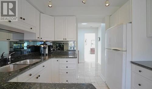 301 - 2190 Lakeshore Road, Burlington, ON - Indoor Photo Showing Kitchen With Double Sink