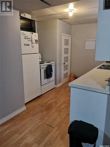 216 6Th Avenue Sw, Eston, SK - Indoor Photo Showing Kitchen With Double Sink