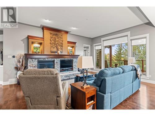 242 Dormie Place, Vernon, BC - Indoor Photo Showing Living Room With Fireplace