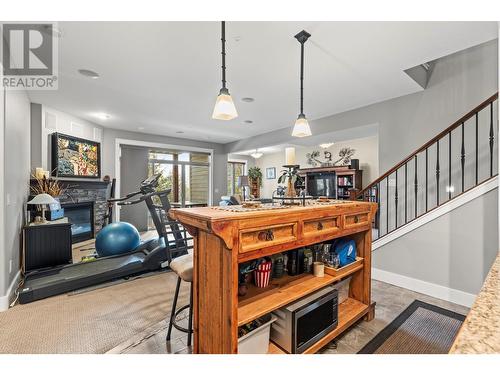 242 Dormie Place, Vernon, BC - Indoor Photo Showing Other Room With Fireplace