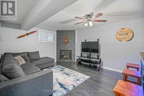 4034 Barry Drive, Lincoln (982 - Beamsville), ON - Indoor Photo Showing Living Room With Fireplace