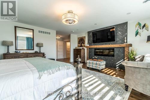 119 Willowbrook Drive, Welland (770 - West Welland), ON - Indoor Photo Showing Bedroom With Fireplace