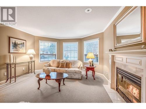 595 Yates Road Unit# 34 Lot# 76, Kelowna, BC - Indoor Photo Showing Living Room With Fireplace