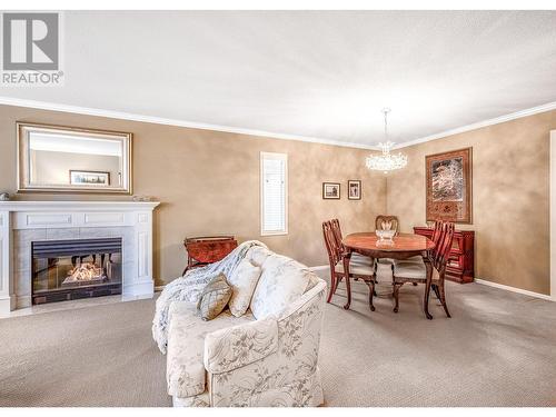 595 Yates Road Unit# 34 Lot# 76, Kelowna, BC - Indoor Photo Showing Living Room With Fireplace