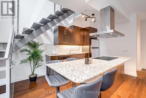 212 - 1 Scott Street, Toronto, ON - Indoor Photo Showing Kitchen With Upgraded Kitchen