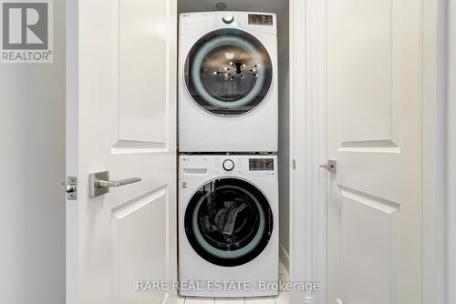 212 - 1 Scott Street, Toronto, ON - Indoor Photo Showing Laundry Room