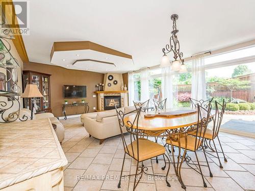 8065 Kipling Avenue, Vaughan, ON - Indoor Photo Showing Dining Room With Fireplace