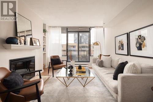 704 - 71 Front Street E, Toronto, ON - Indoor Photo Showing Living Room With Fireplace