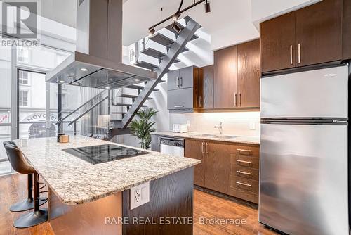 212 - 1 Scott Street, Toronto, ON - Indoor Photo Showing Kitchen With Double Sink