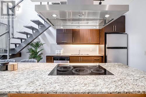 212 - 1 Scott Street, Toronto, ON - Indoor Photo Showing Kitchen With Double Sink With Upgraded Kitchen