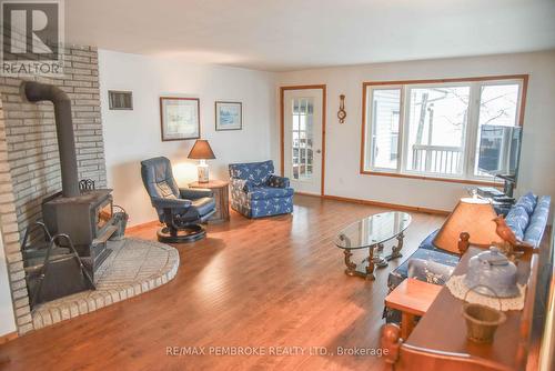 218 Greenway Drive, Whitewater Region, ON - Indoor Photo Showing Living Room With Fireplace