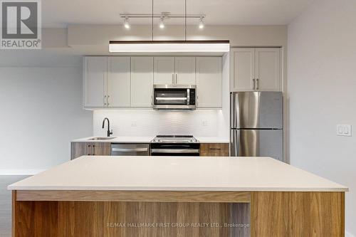 327 - 201 Brock Street S, Whitby, ON - Indoor Photo Showing Kitchen With Stainless Steel Kitchen With Upgraded Kitchen