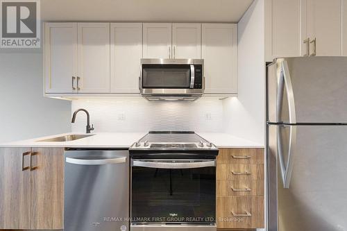 327 - 201 Brock Street S, Whitby, ON - Indoor Photo Showing Kitchen With Stainless Steel Kitchen With Upgraded Kitchen