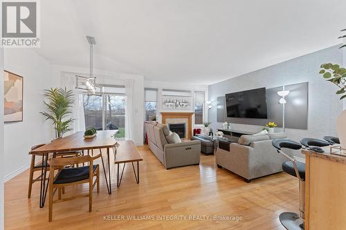 435 Celtic Ridge Crescent, Ottawa, ON - Indoor Photo Showing Living Room With Fireplace