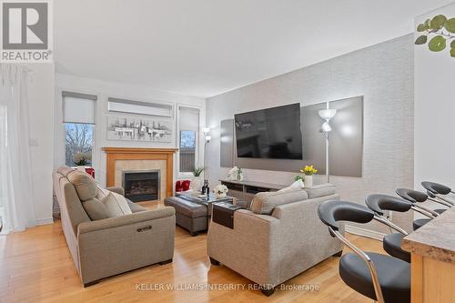 435 Celtic Ridge Crescent, Ottawa, ON - Indoor Photo Showing Living Room With Fireplace