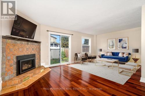 49 Foxfield Drive, Ottawa, ON - Indoor Photo Showing Living Room With Fireplace