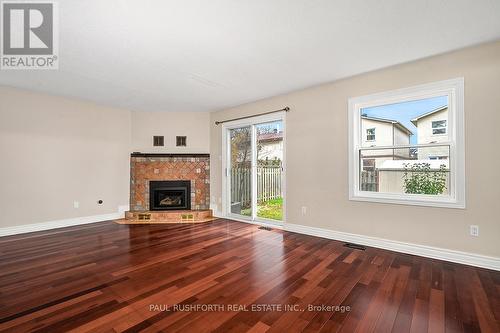 49 Foxfield Drive, Ottawa, ON - Indoor Photo Showing Living Room With Fireplace