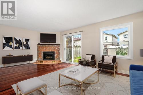 49 Foxfield Drive, Ottawa, ON - Indoor Photo Showing Living Room With Fireplace