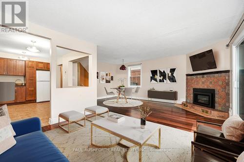 49 Foxfield Drive, Ottawa, ON - Indoor Photo Showing Living Room With Fireplace