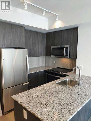 3009 - 20 Shore Breeze Drive, Toronto, ON - Indoor Photo Showing Kitchen With Upgraded Kitchen