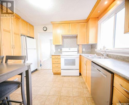 528 L Avenue N, Saskatoon, SK - Indoor Photo Showing Kitchen With Double Sink