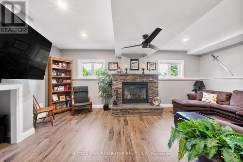 1277 Sunnidale Road, Springwater, ON - Indoor Photo Showing Living Room With Fireplace