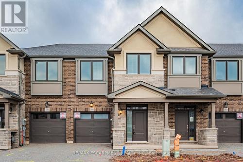 5 - 2184 Postmaster Drive, Oakville, ON - Outdoor With Facade