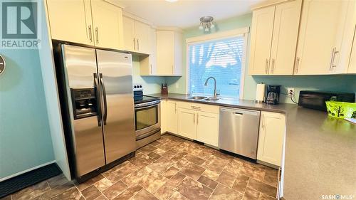 1310 6Th Avenue N, Saskatoon, SK - Indoor Photo Showing Kitchen With Double Sink