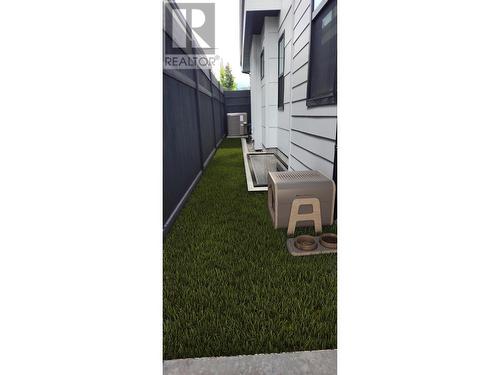 Dog run alon north side of house - 509 Eldorado Road, Kelowna, BC - 