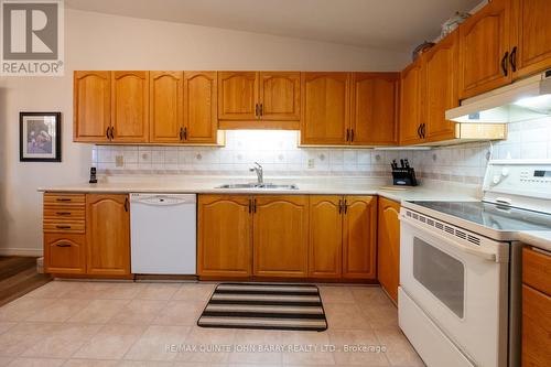 305 - 56 Tripp Boulevard, Quinte West, ON - Indoor Photo Showing Kitchen With Double Sink